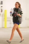 Miley Cyrus in Ash TOMS Espadrilles 2b.jpg