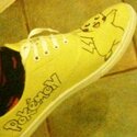 pikachu_shoes_by_gizzmo95-d4p68xk.jpg