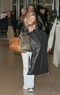 120704Kate Bosworth arrives at JFK Airport in New York.jpg