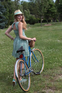 girl-in-green-dress-with-bike.jpg