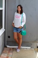 graphic-sweatshirt-cutoff-shorts-striped-sneakers-2.jpg