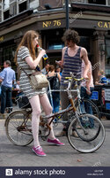 bicycle-chic-hm-dress-and-a-pair-of-keds-while-out-with-her-bicycle-GDX7EP.jpg