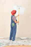 3675739-woman-in-overalls-using-roller-on-extension-pole-painting-wall.jpg