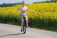 Who_Invented_Unicycle_girl_xl_40148456_(Custom).jpg