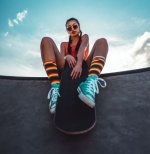 Skater girl in turquoise chucks.JPG