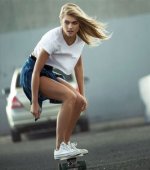 Skater girl in white low tops.jpg