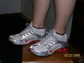 white, silver, & red nike shox navina.jpg