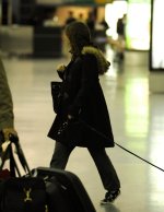 27784_Tikipeter_Natalie_Portman_departs_JFK_Airport_005_123_488lo.jpg