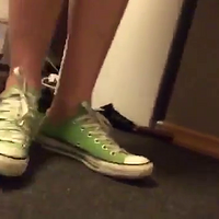 girl shoeplay with converse.mp4