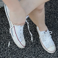 well worn women's converse chuck taylor white red shoes.mp4