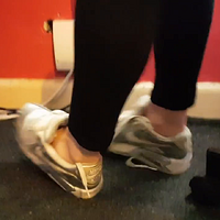 foot shoe play in my well worn silver nike air max trainers.mp4