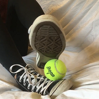 converse, socks and feet play with a tennis ball.mp4